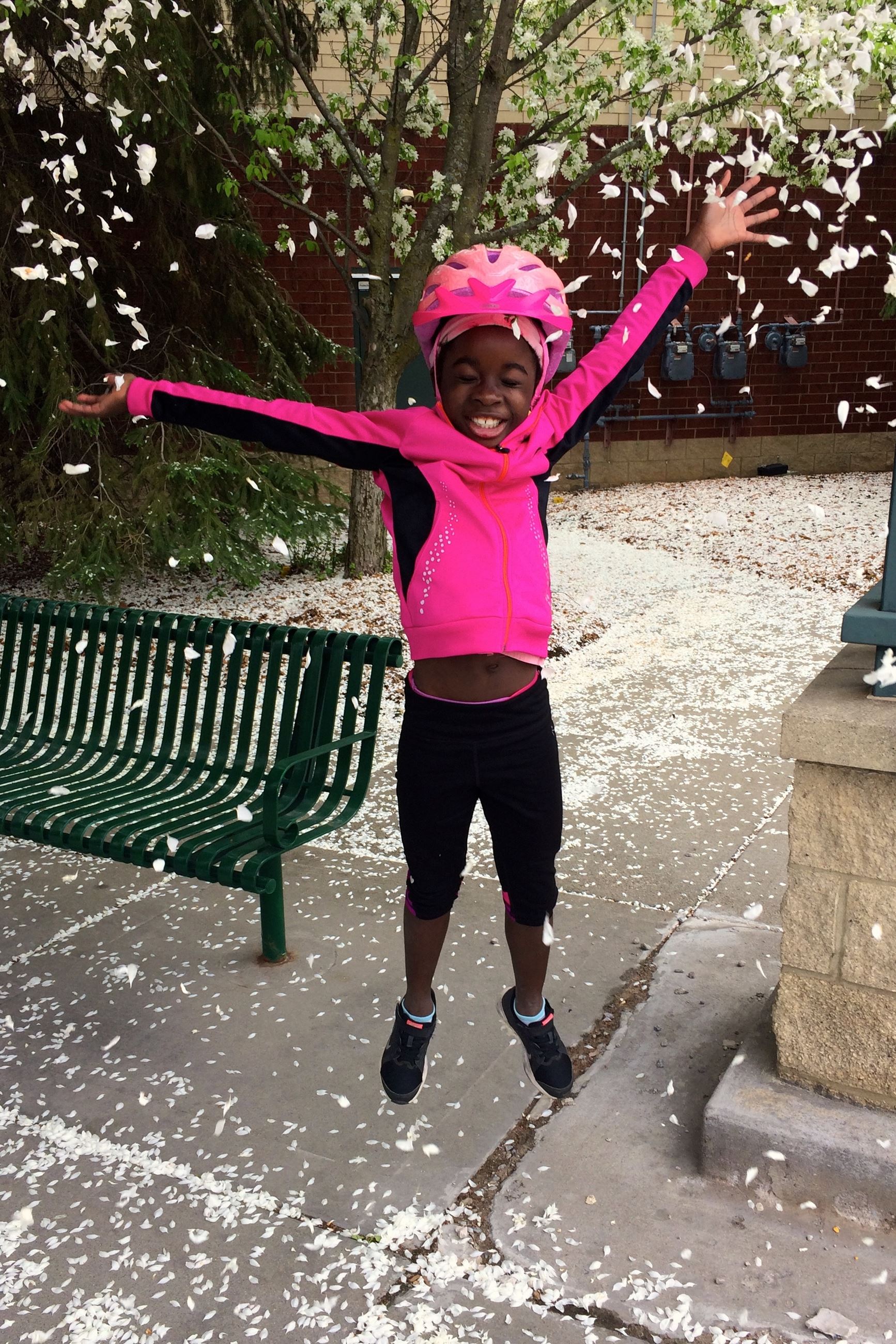 24.1-Becky-Hofstad-Amidst -Airborne-Flowering-Tree-Petals